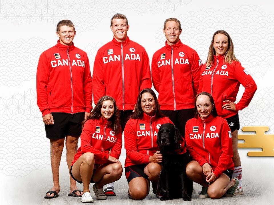 Image of Victoria and family with her seeing eye dog