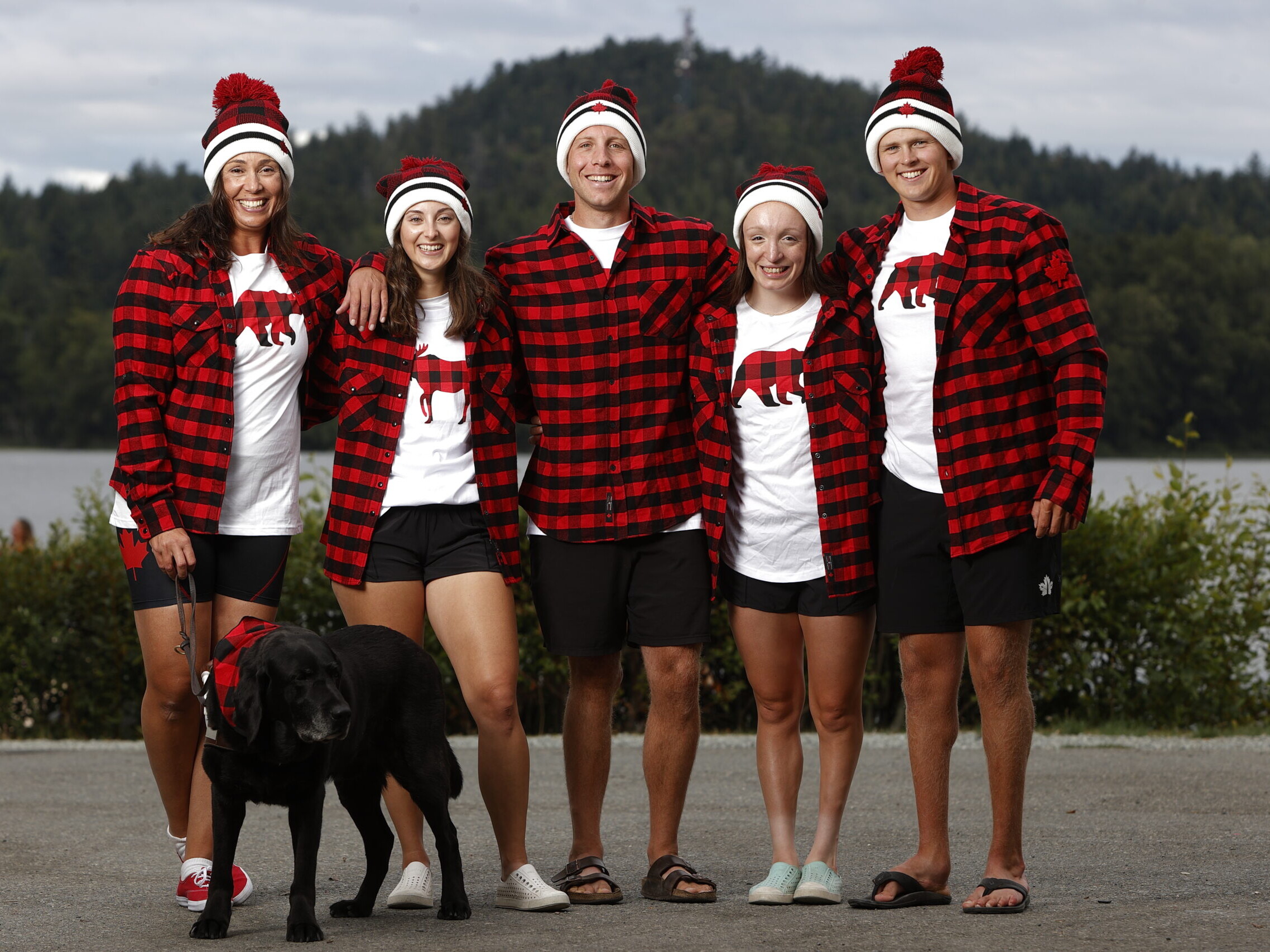 Image of Victoria and family with her seeing eye dog